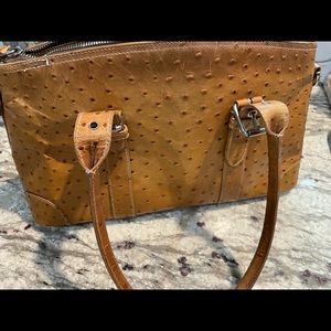 Tan ostrich Dooney and Bourke Bag